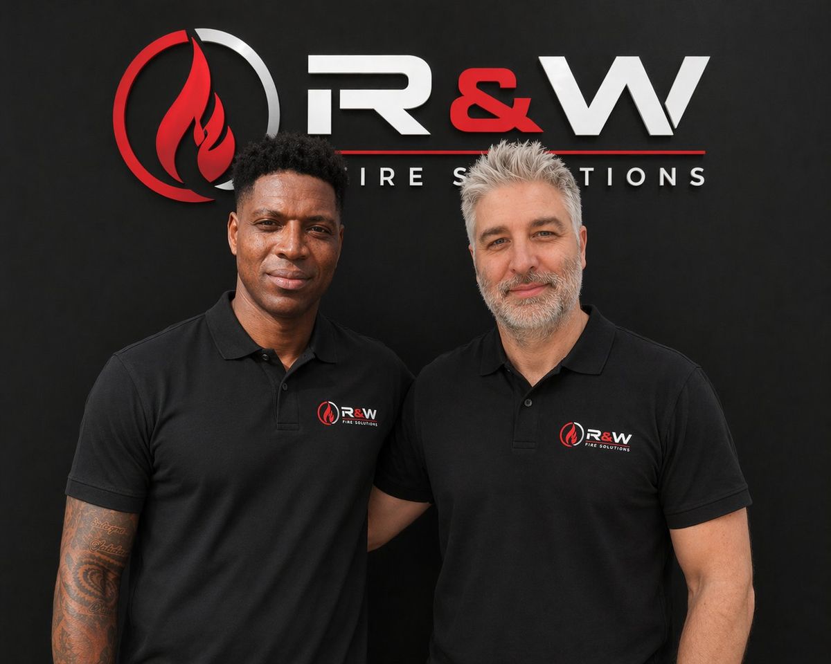 Tom and Calvin, co-founders of R&W Fire Solutions Ltd, in branded polos